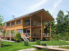 Holzrahmenbau, BSH-Decken, Sicht-Dachstuhl, Doppelrhombus Schalung Lärche, Balkon Lärche
